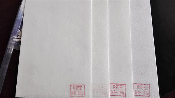 沙發(fā)背襯布供應(yīng)商_蘭花王**材料提供的無紡布哪里好