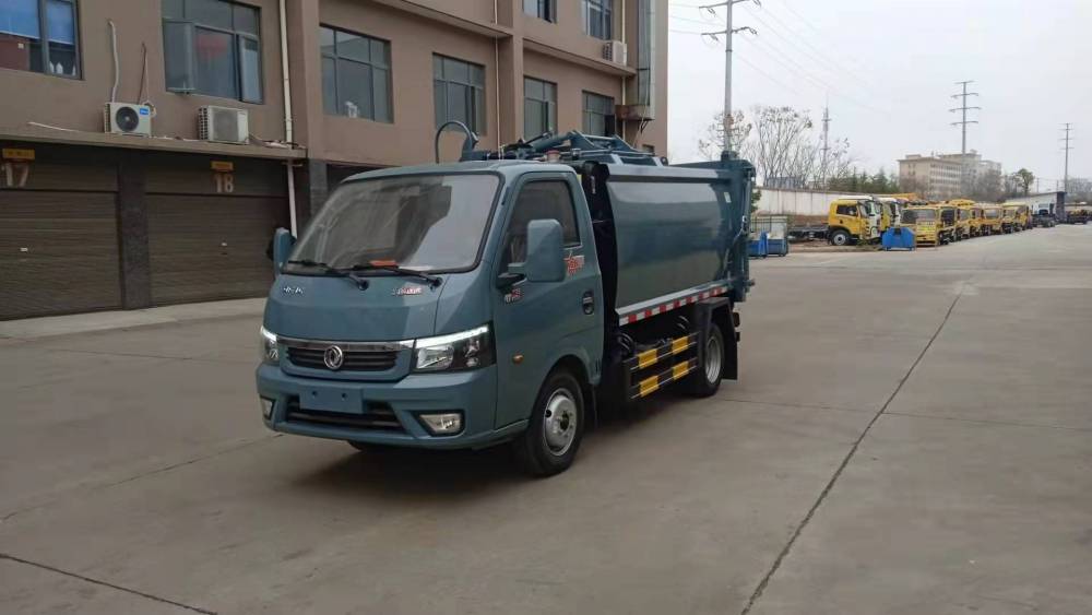 東風途逸4方側(cè)裝壓縮垃圾車 藍牌不**重上戶**